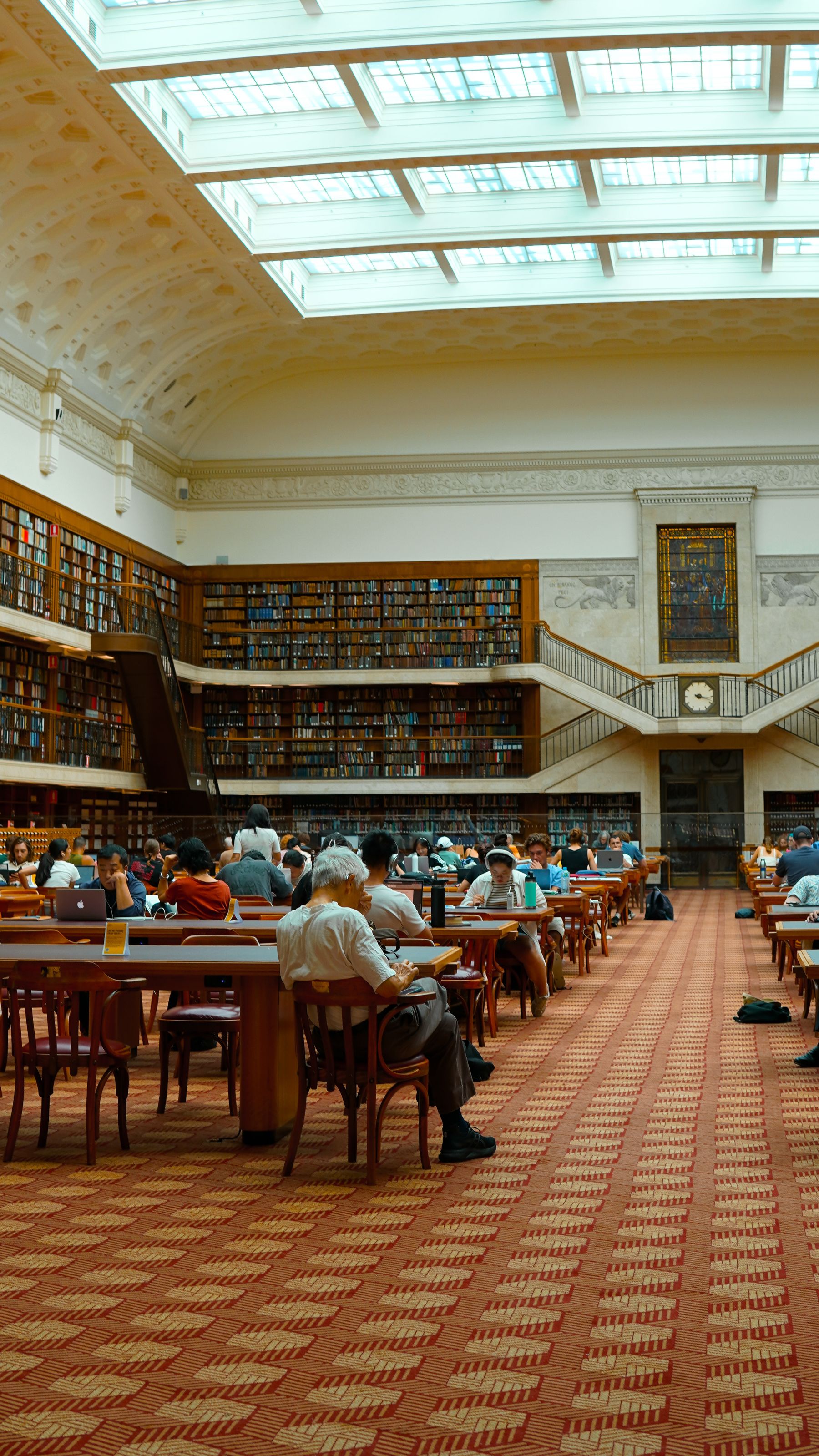 A large, light-filled library reading hall