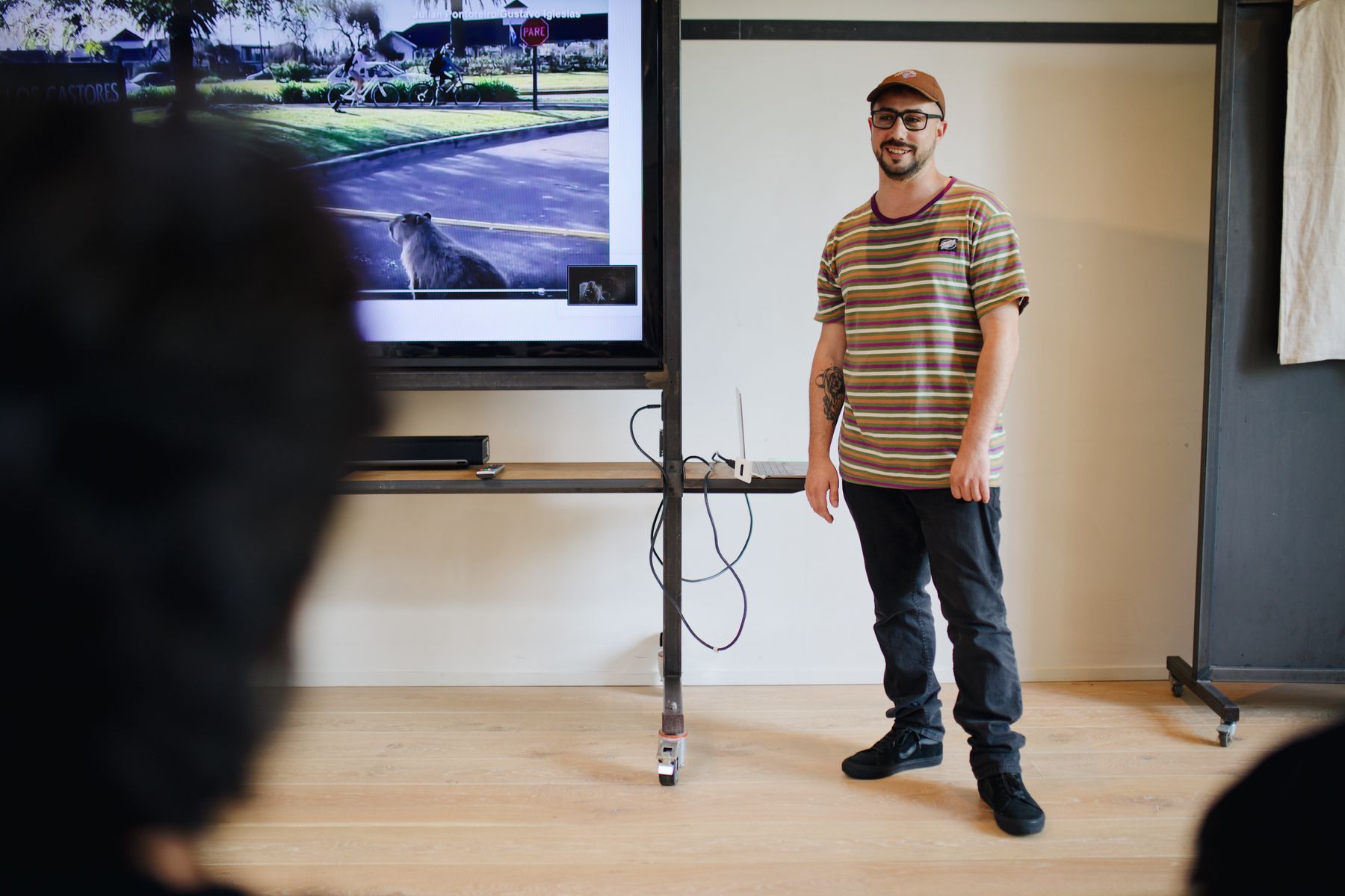 A student presenting a prototype to a small audience