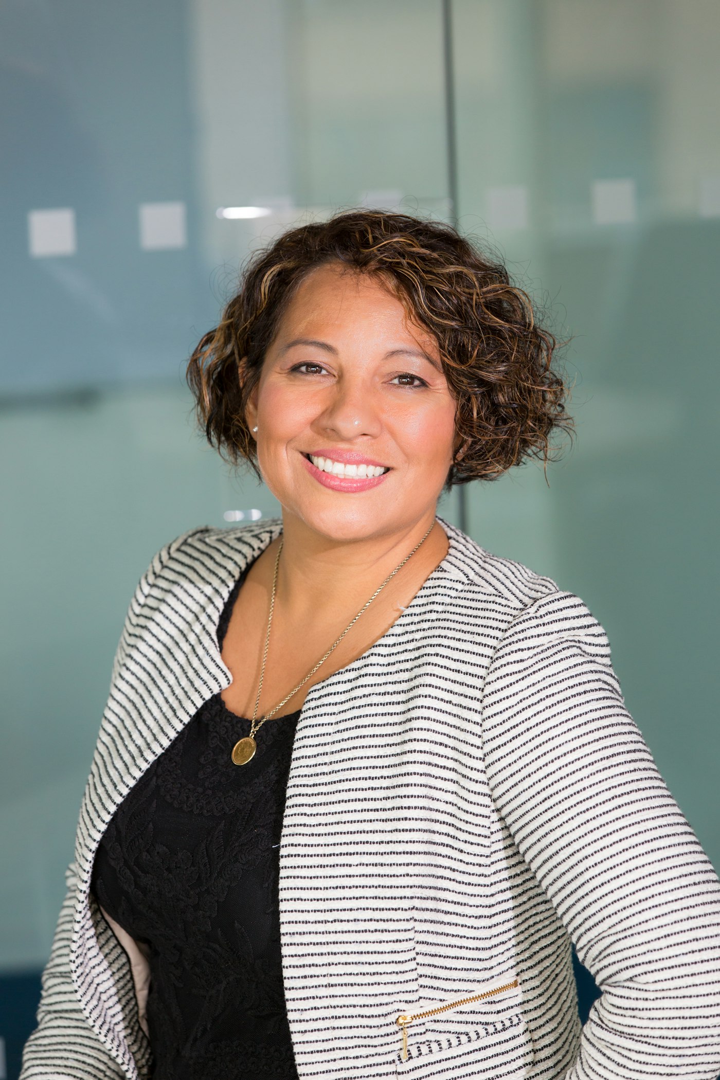 Portrait of a smiling team member in an office