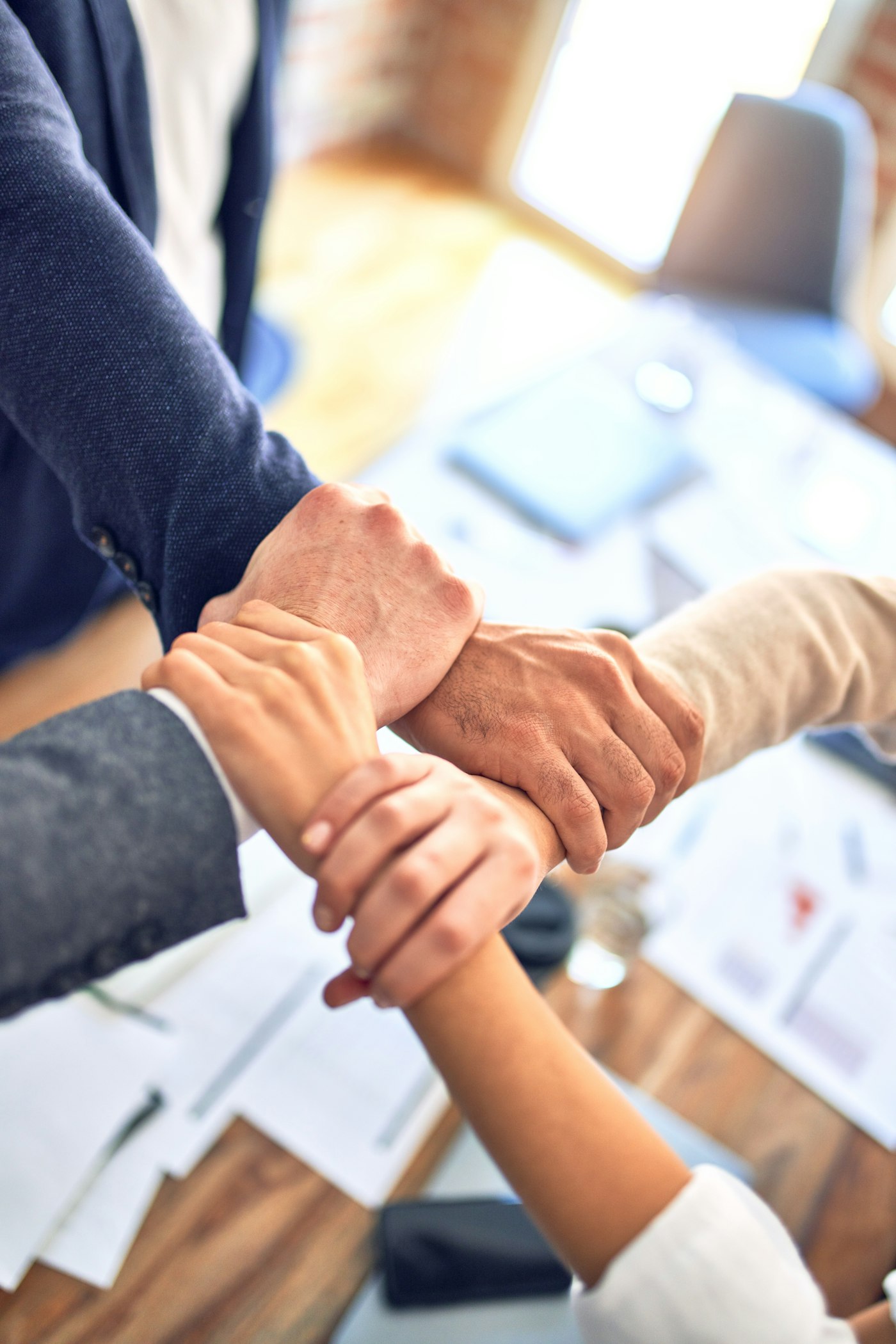 Two people shaking hands after an agreement